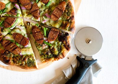 Grilled Lightlife Plant-Based Italian Sausage and Pesto Pizza