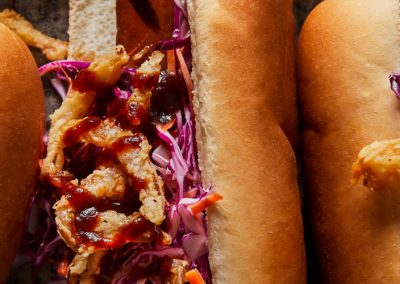 Tangy Slaw Dog with Fried Onions